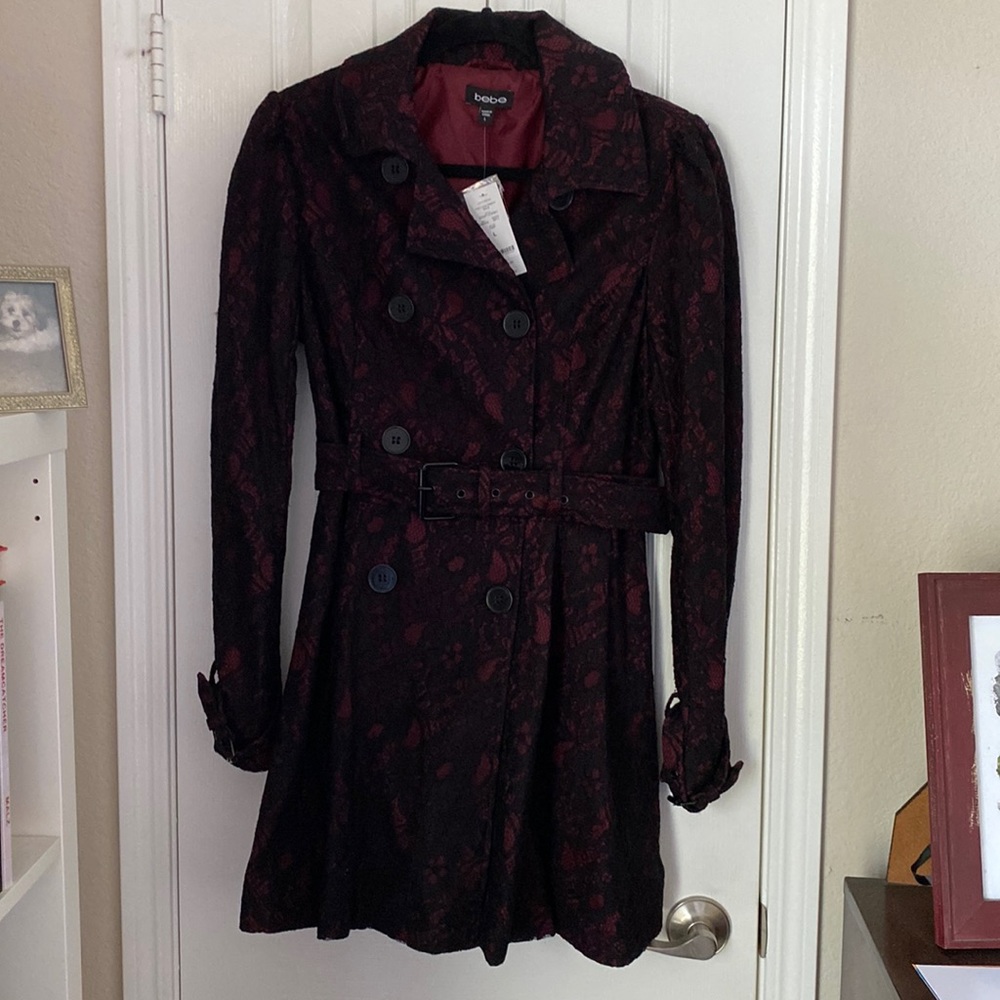 Brand new with tags Bebe burgundy black lace coat.